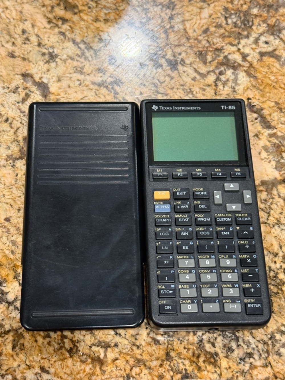 Texas Instruments TI-85 Graphing Calculator in Black with Green Screen